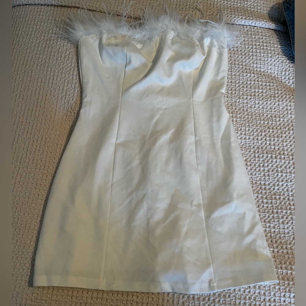 Pepper Mayo Mini dress with feathers!